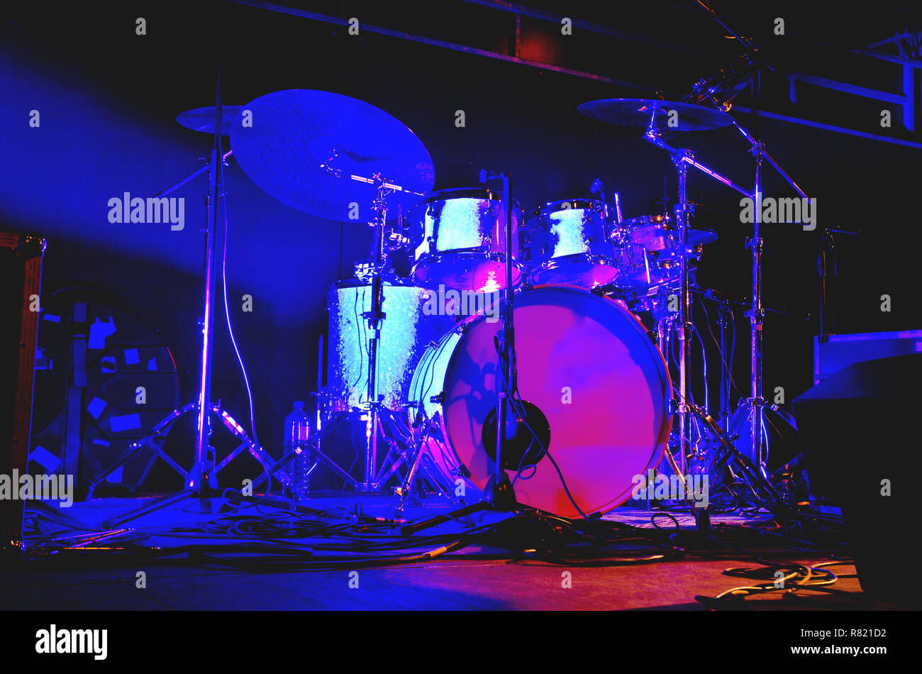 drum set on a stage in blue light Stock Photo