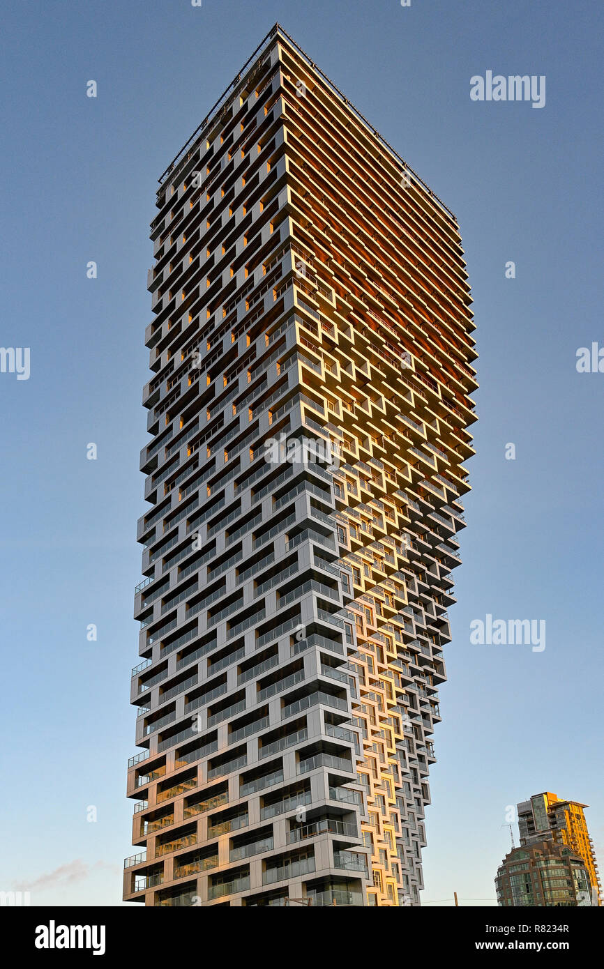 Unusual High rise condo building, Vancouver House,  Bjarke Ingels Group architects, Vancouver, British Columbia, Canada. Stock Photo