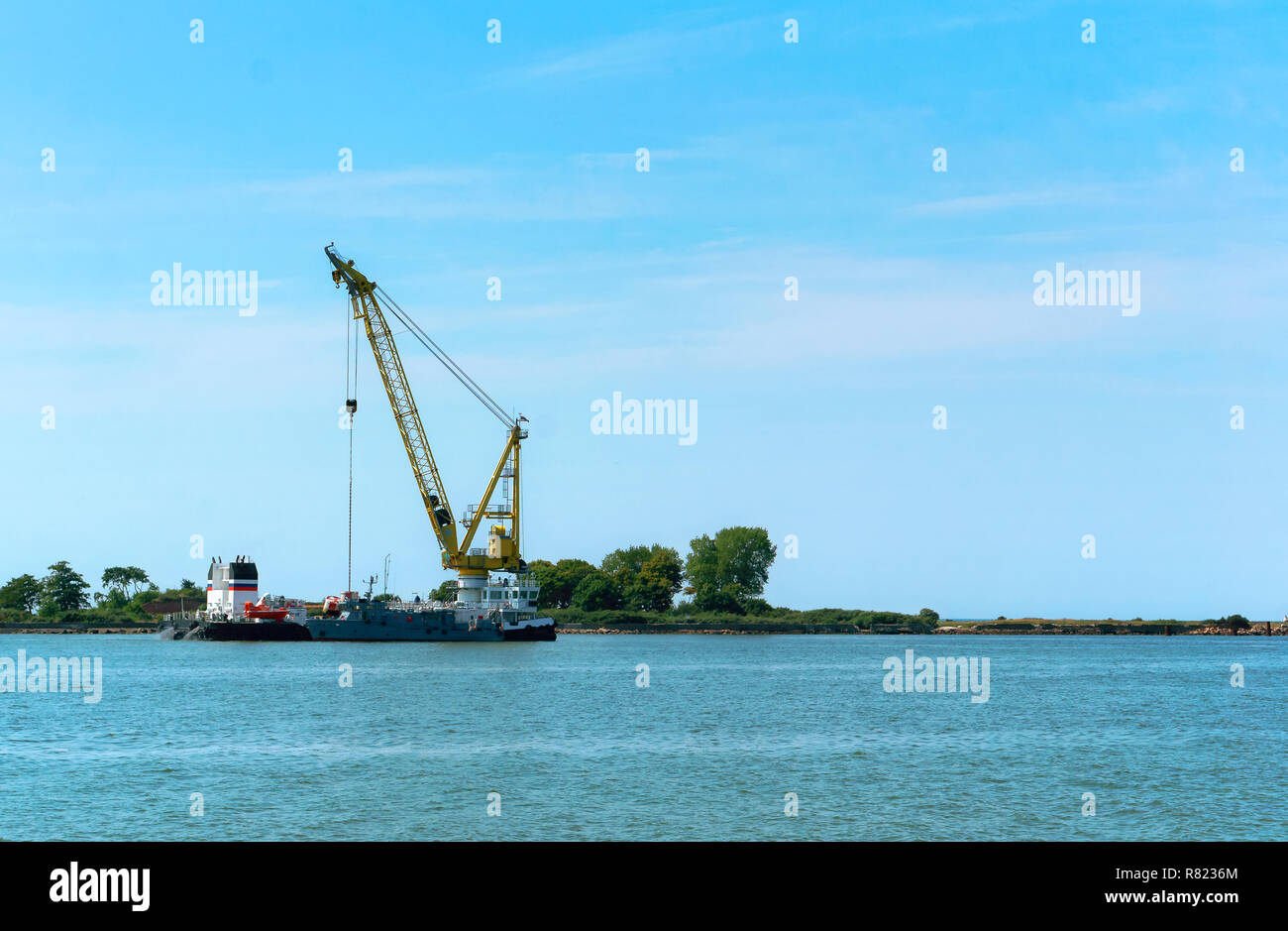 09 August, Kaliningrad region, Russia, floating crane, bottom cleaning, mining, loading and unloading Stock Photo