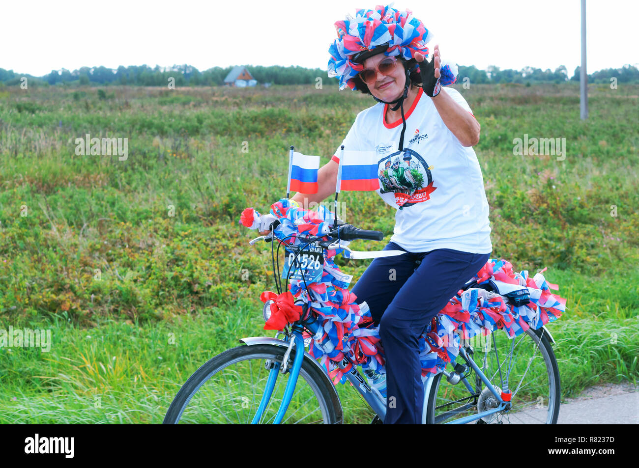 02 September 2018, Kaliningrad region, Russia, elegant cyclist on the ...