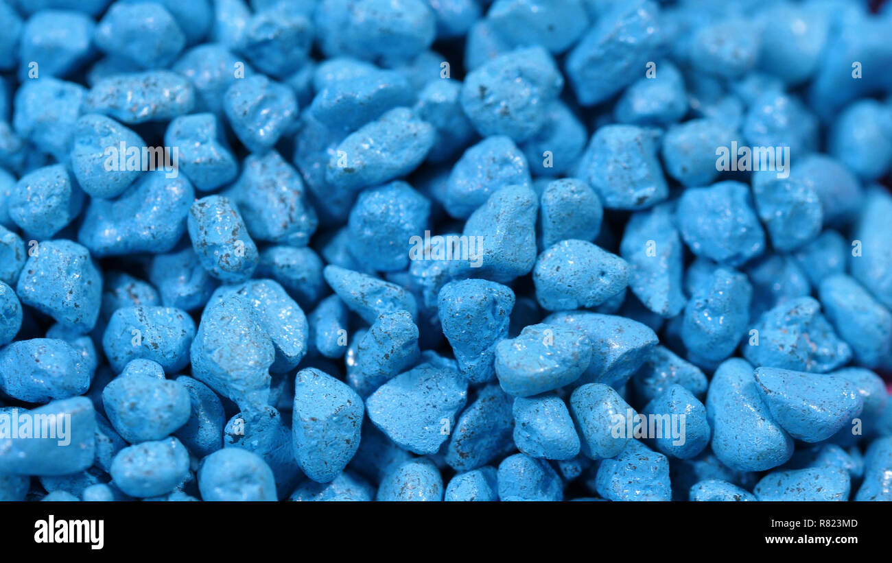 Closeup of decorative blue crushed stone.Crushed stone crumb granite