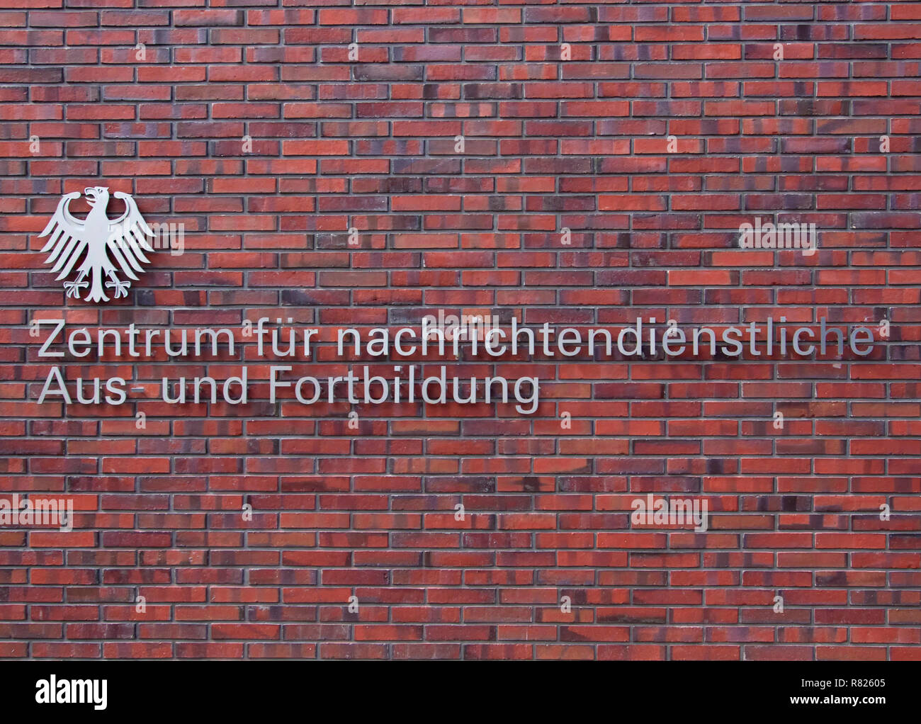 Centre for intelligence training, inscription with federal eagle on brick wall, Bundesnachrichtendienst BND, Berlin, Germany Stock Photo