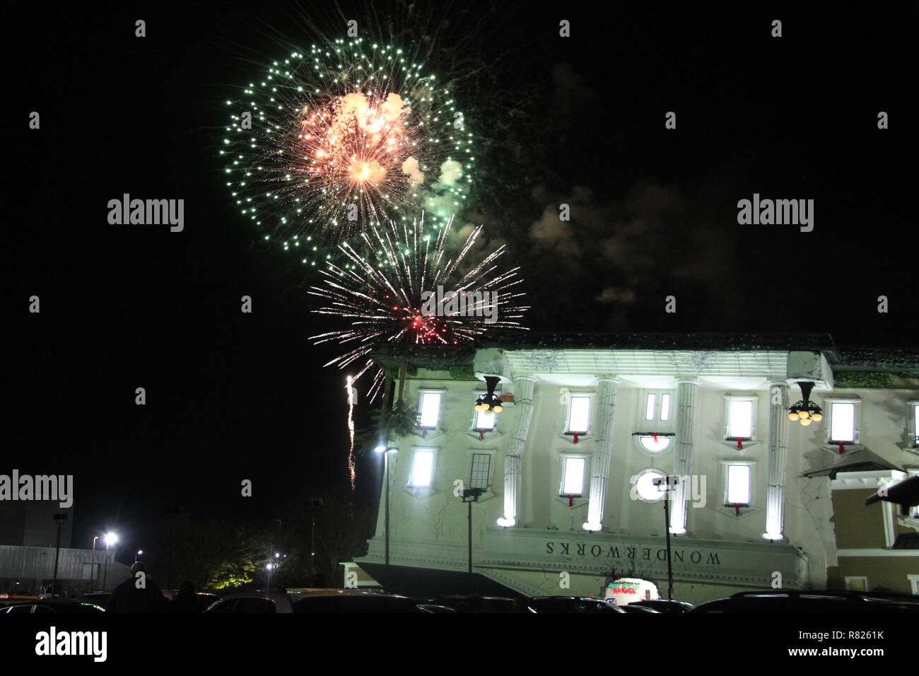 Fireworks show seen over WonderWorks upside down building in Pigeon