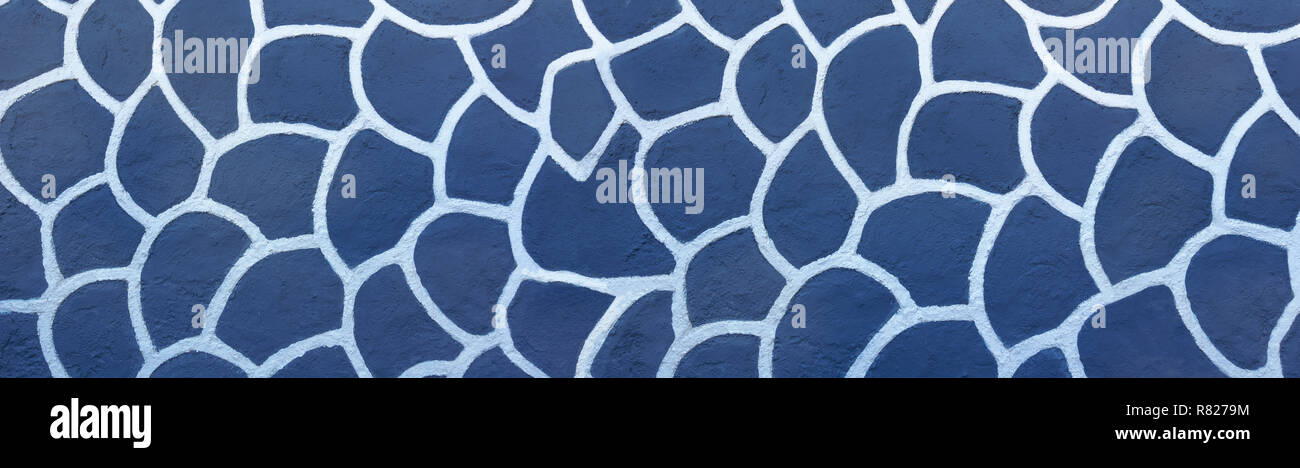White pattern on a blue wall Stock Photo