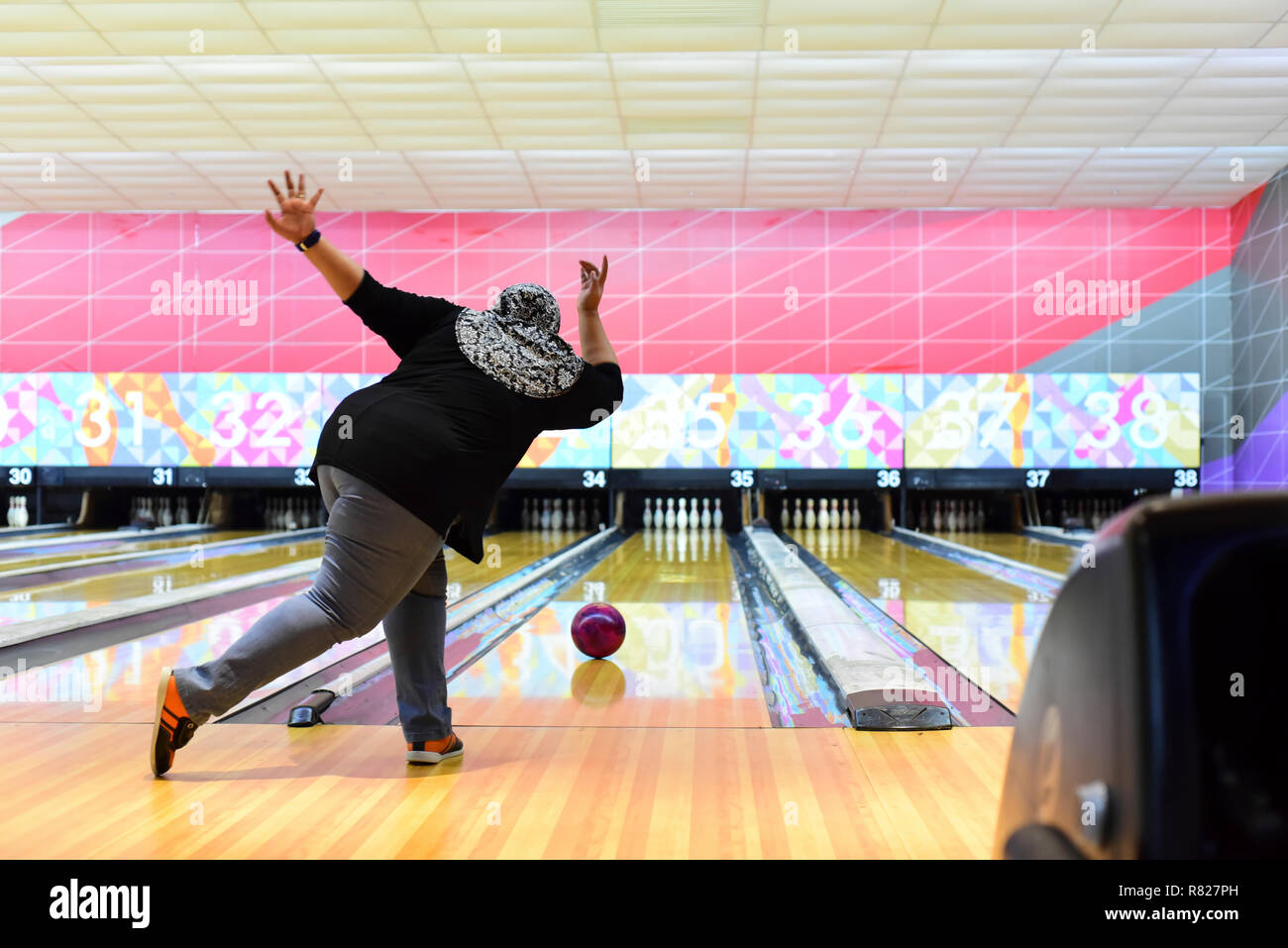 Women bowler throw the ball at the bowling lane Stock Photo Alamy