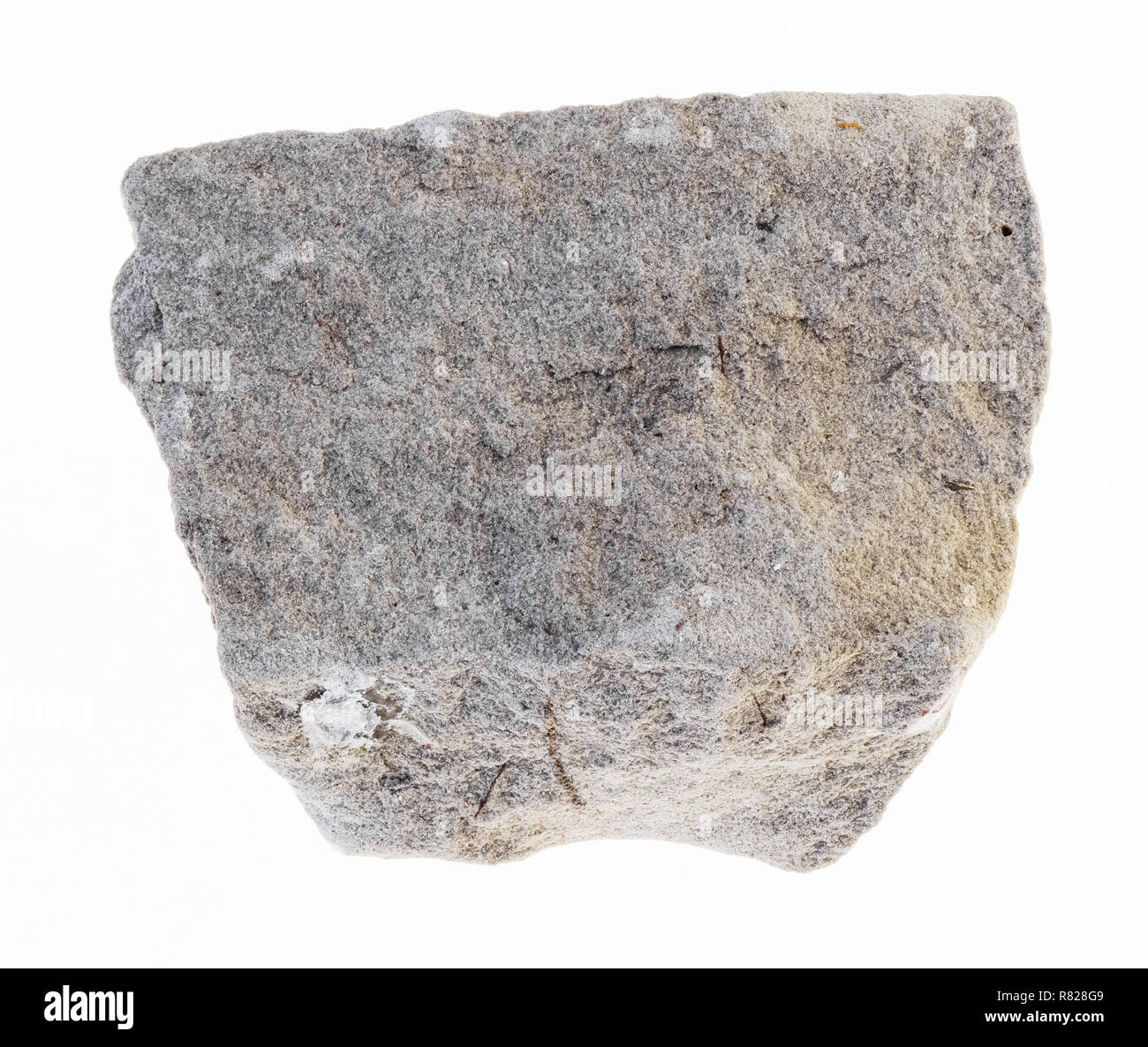 macro photography of natural mineral from geological collection - rough dolomite stone on white background Stock Photo