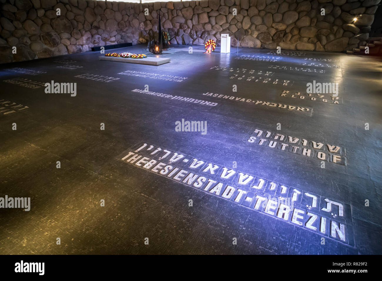 list of concentration camps of the third Reich during the second world war on the floor in Yad Vashem memorial of the Holocaust and genocide of the Jewish people. JERUSALEM, ISRAEL. 24 October 2018. Stock Photo