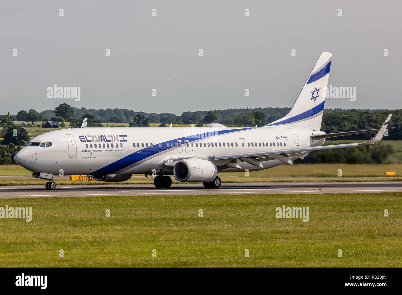 An El Al Israeli Boeing 737 aircraft, registration 4X-EHH, preparing for take off at London Luton Airport. Stock Photo