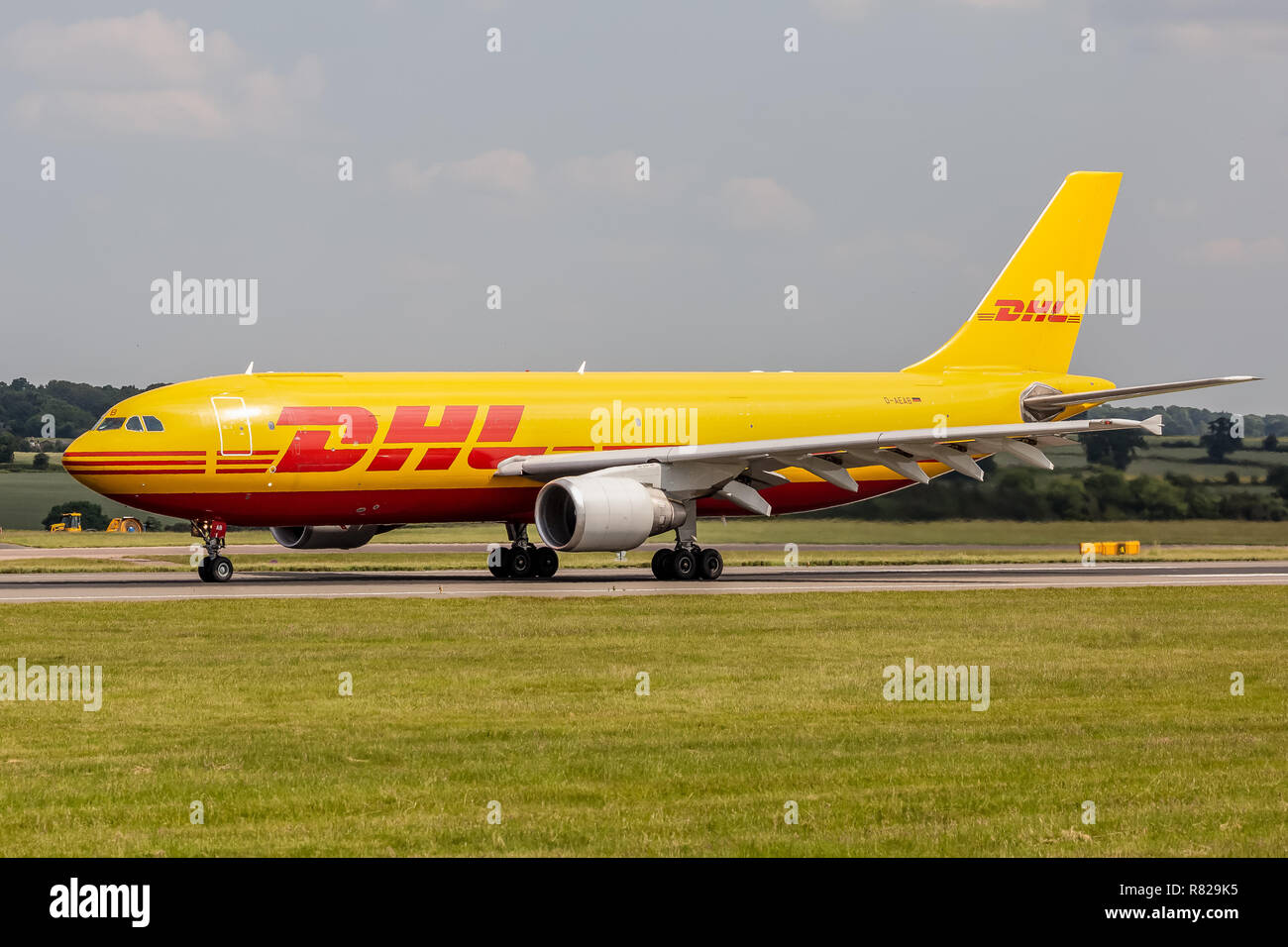 An Airbus A300 cargo aeroplane, D-AEAB, belonging to the international courier, parcel, and express mail service DHL, at London Luton Airport. Stock Photo
