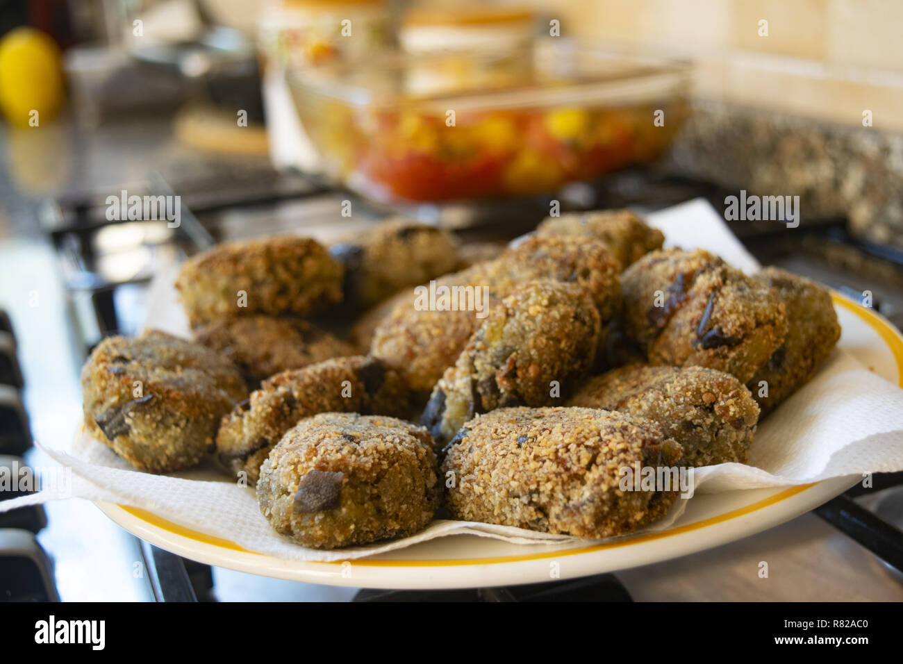 fried and spicy crushed Calabrian eggplant meatballs Stock Photo Alamy