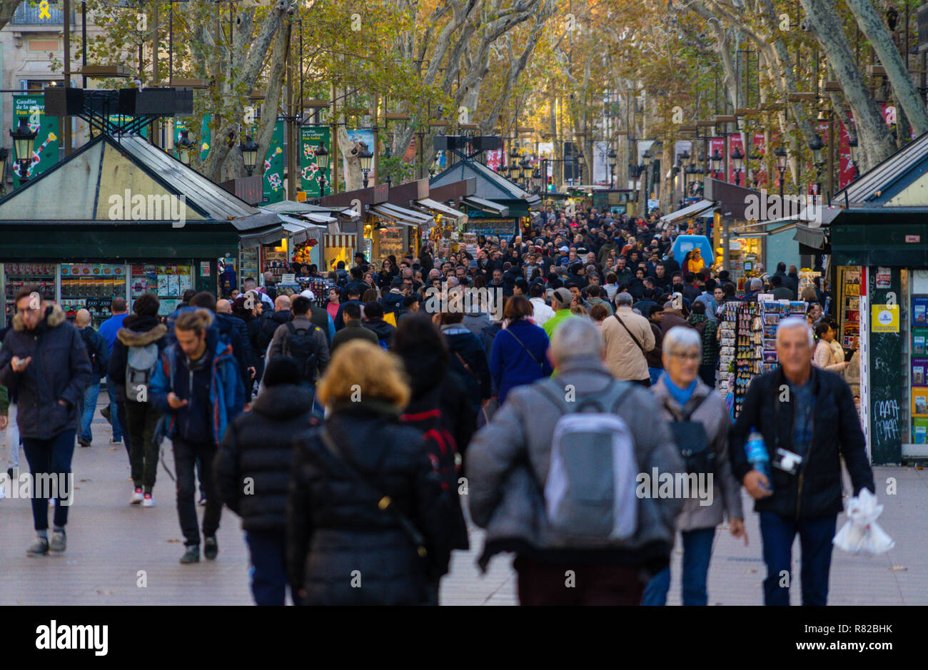 Barcelona, Spain. December 2018:Crowd of anonymous people walking on the Rambla of Barcelona Stock Photo
