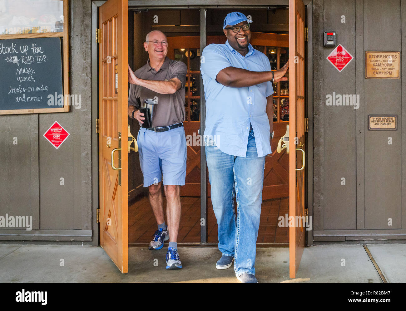 Birmingham pastors Bob Flayhart and Alton Hardy smile as they leave Cracker Barrel in Birmingham, Alabama. They are working to improve race relations. Stock Photo