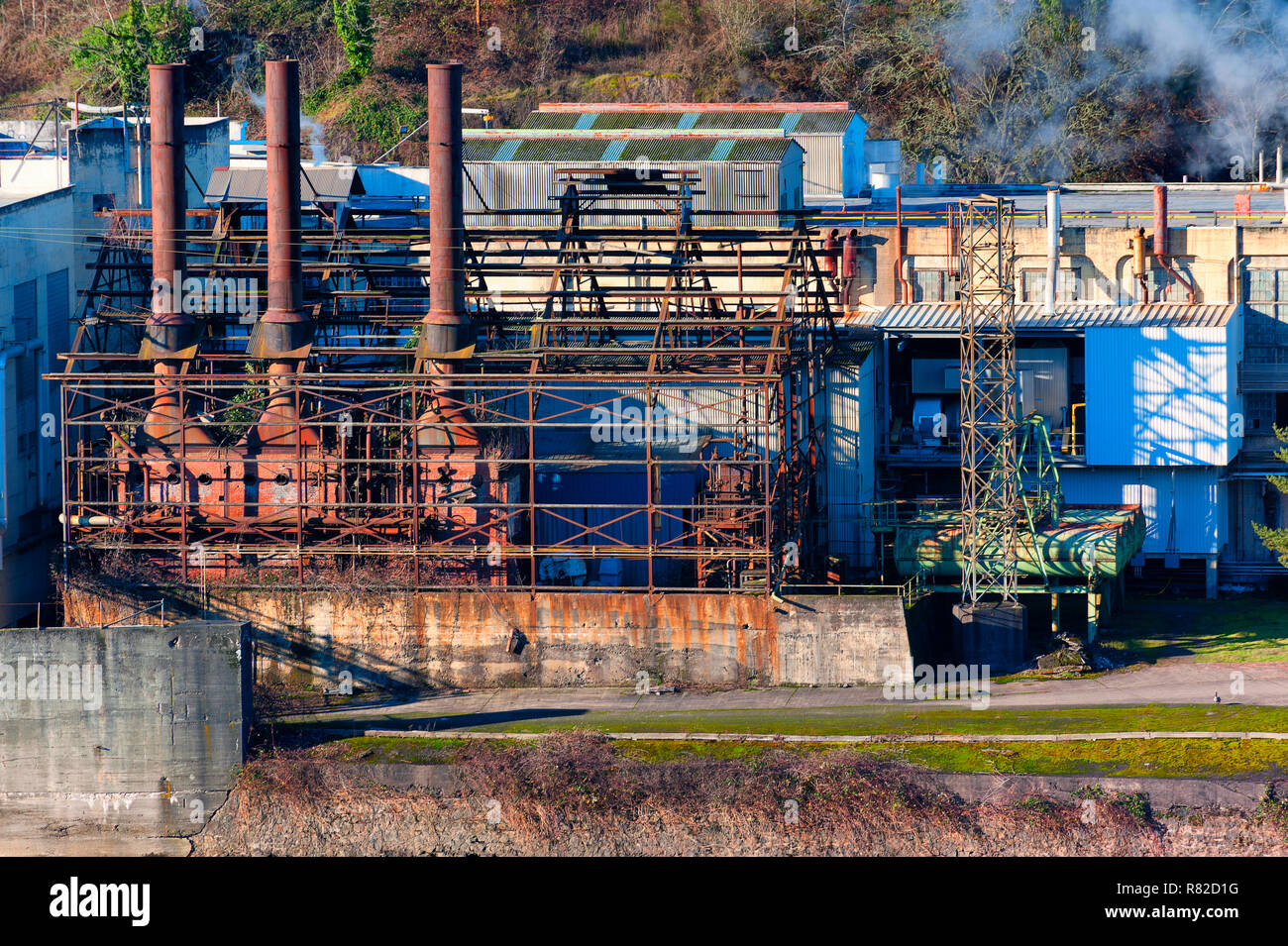 Close up on section of a power plant that is no longer productive on the Willamette River in Oregon City. Stock Photo