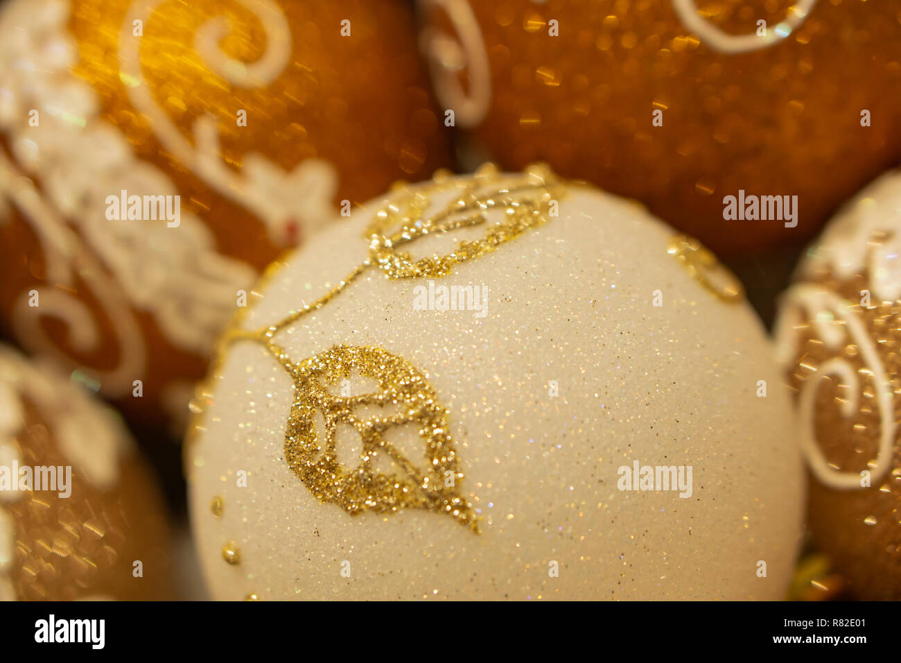 Spruce branches, fir cones and Christmas decorations. Christmas still life. Christmas decorations on music sheets, closeup. Stock Photo