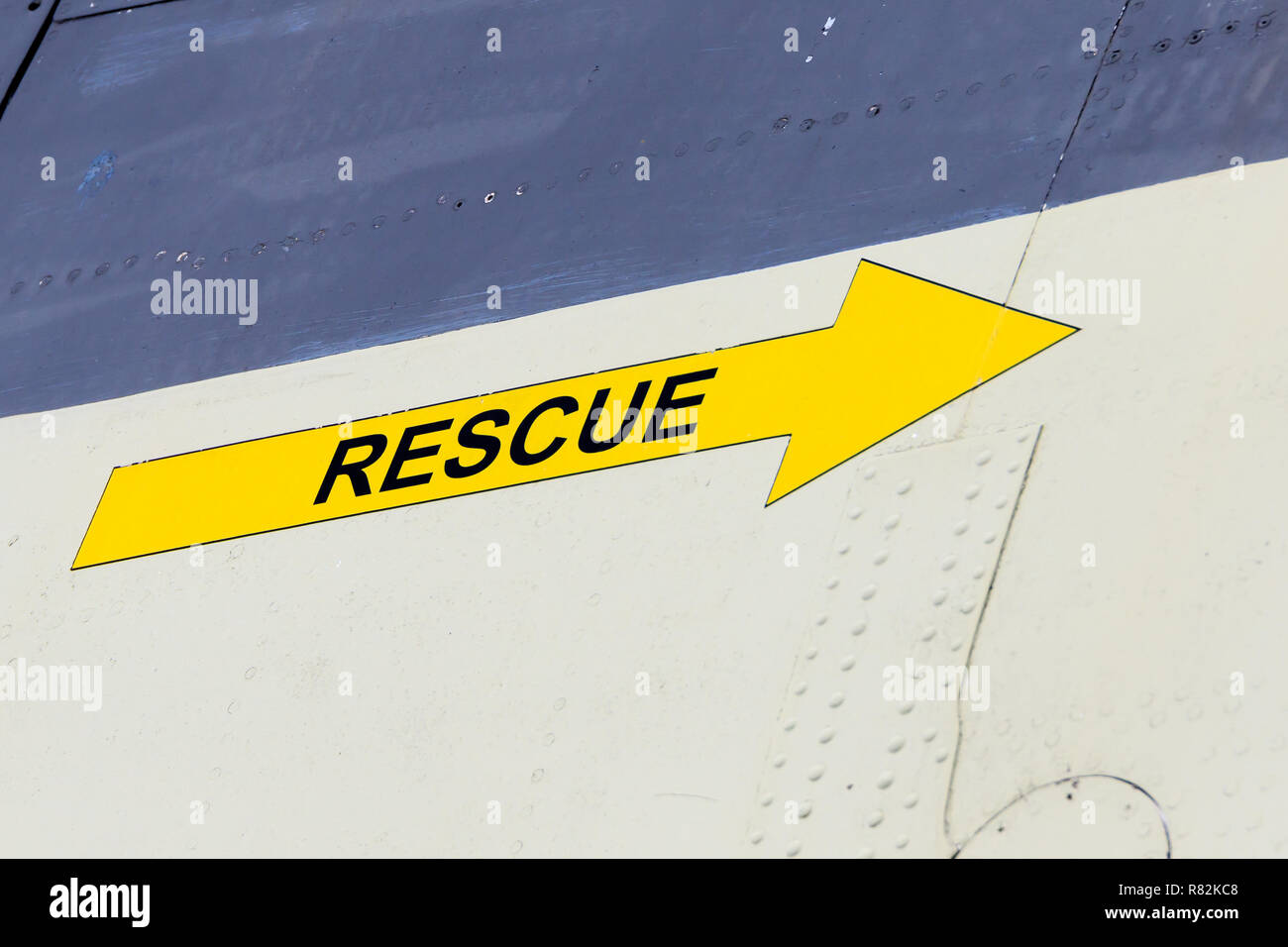 Close up on a yellow Rescue arrow on an old jet plane Stock Photo
