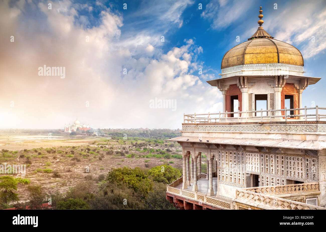 Taj Mahal view from Agra Fort blue cloudy sky in India Stock Photo