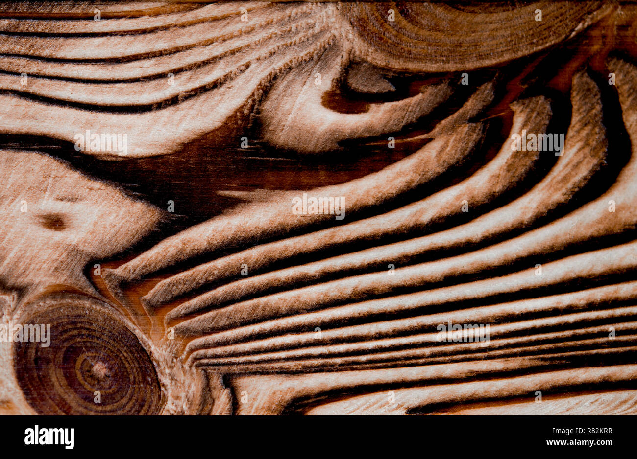 Vintage aged dark brown wooden background texture close up. texture of a wooden board of solid wood. Stock Photo