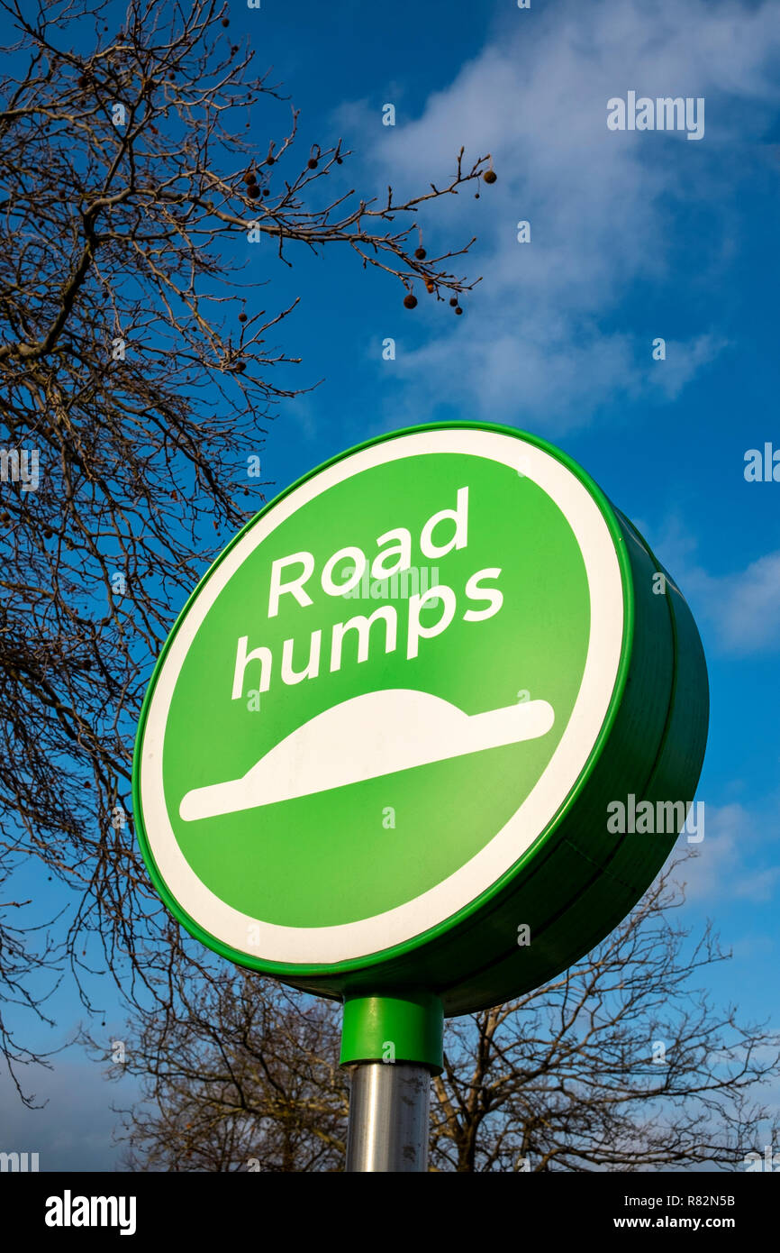 Road humps warning sign on Asda parking space UK Stock Photo