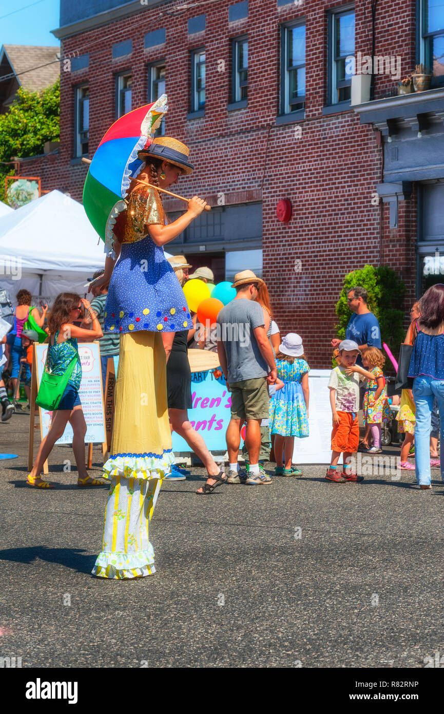 Clown stilts hi-res stock photography and images - Alamy