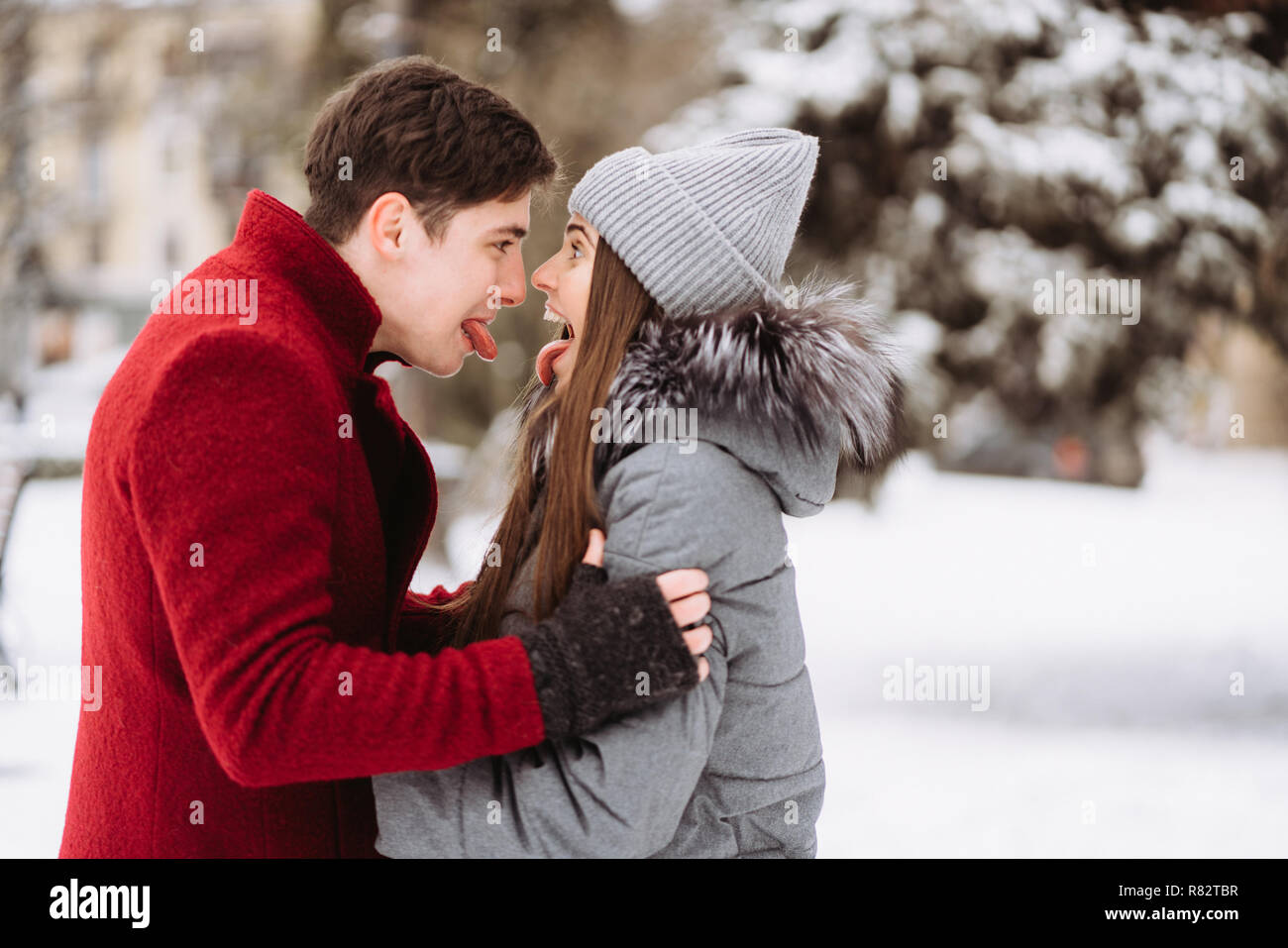 A young guy and a girl are hugging each other Stock Photo - Alamy
