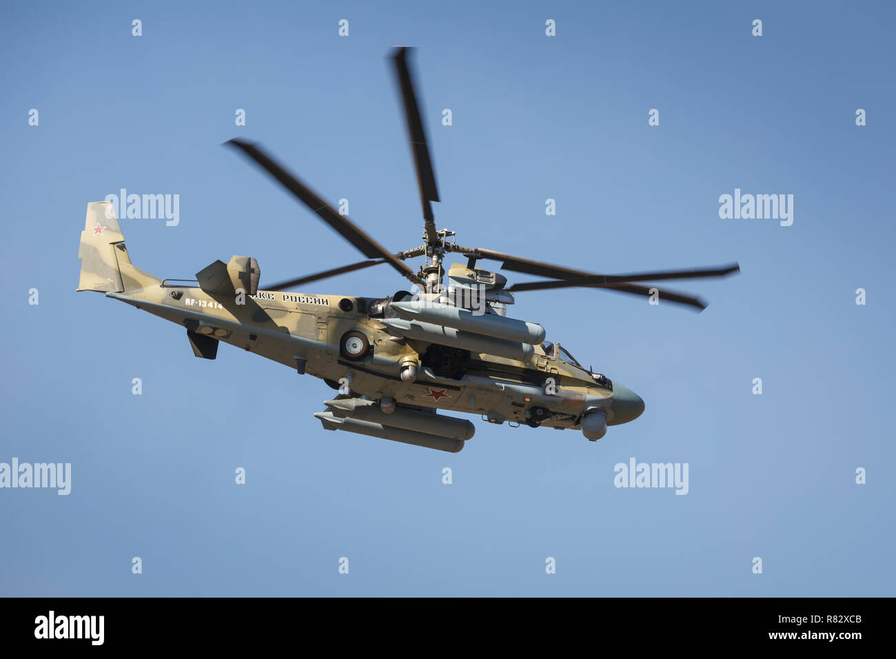 Attack helicopter Ka-52 Alligator, named the flying tank. Left side view, in flight Stock Photo
