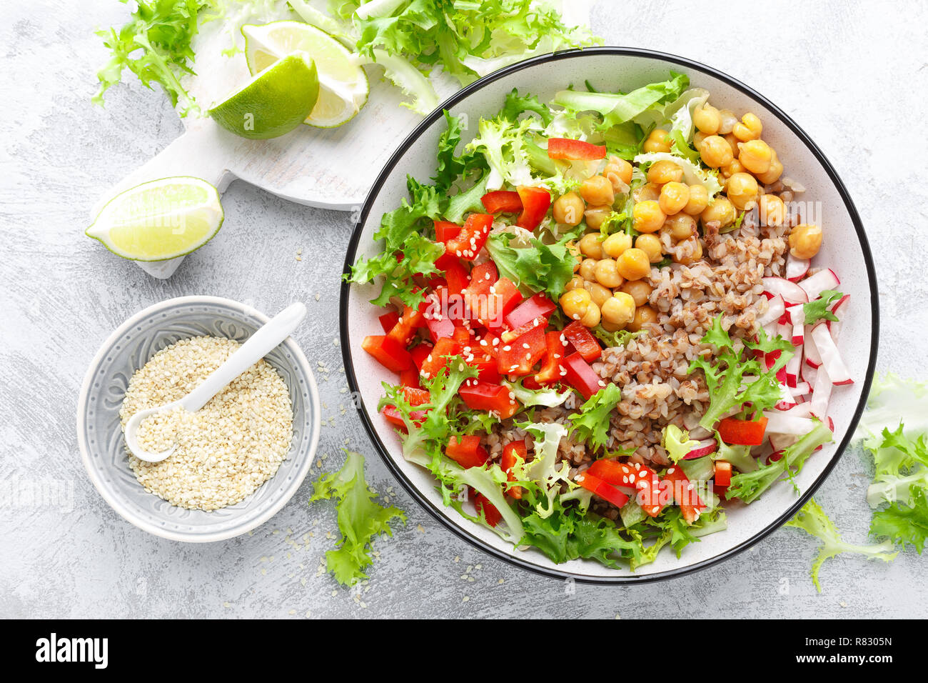 Healthy and delicious bowl with buckwheat and salad of chickpea, fresh