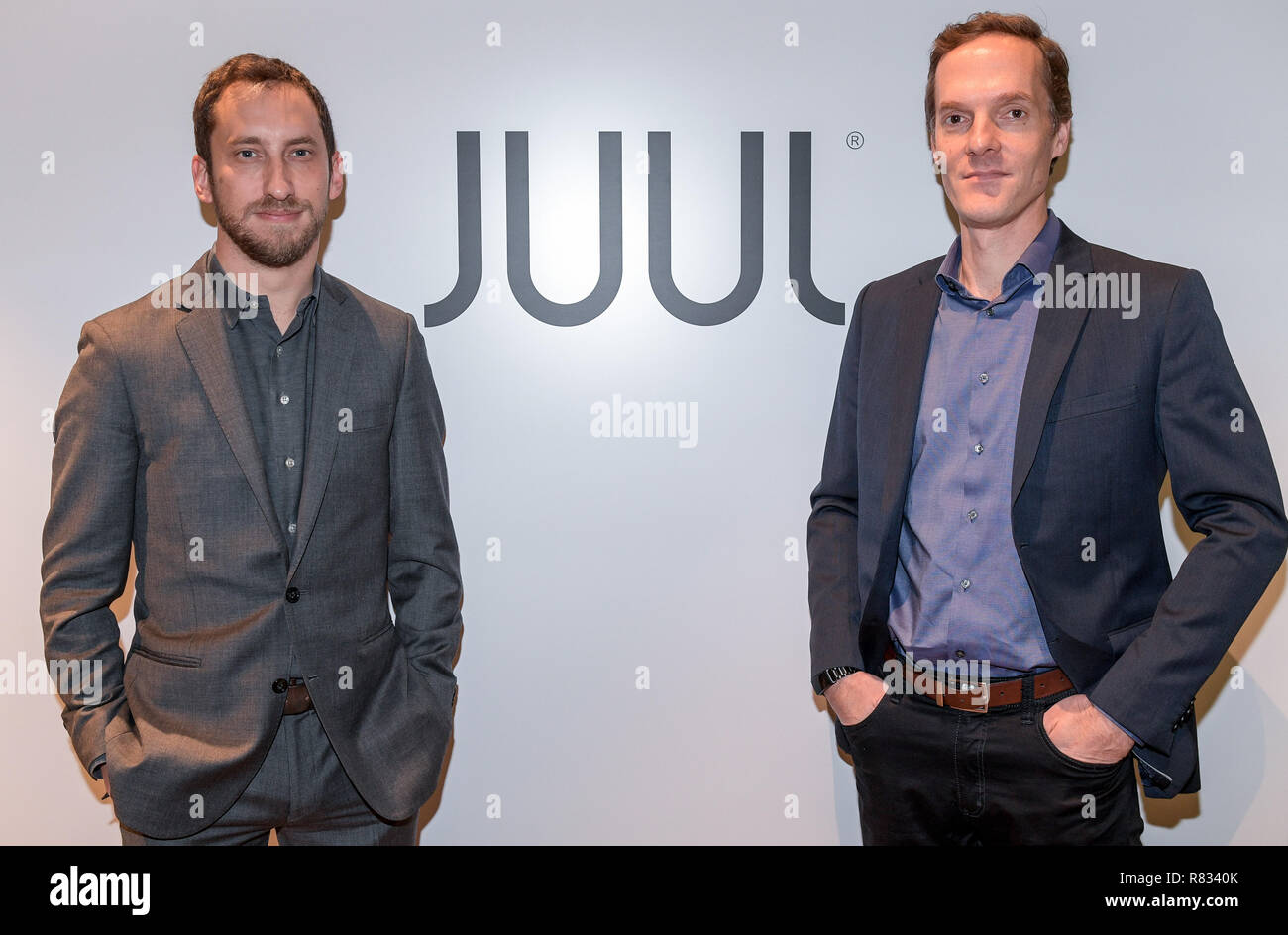 Hamburg, Germany. 12th Dec, 2018. James Monsees (l) and Adam Bowen, founder  of the e-cigarette manufacturer "Juul", look into the photographer's camera  at the Hotel Tortue. "Juul" is the market leader for