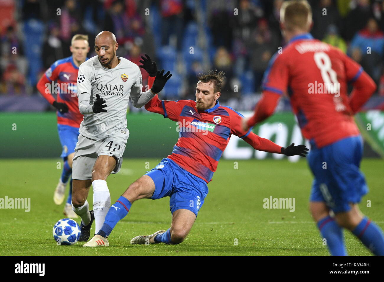 Pilsen, Czech Republic. 12th Dec, 2018. From left STEVEN NZONZI of Rome and TOMAS CHORY of Viktoria in action during the Football Champions League 6th round match: Viktoria Plzen vs AS Roma in Pilsen, Czech Republic, December 12, 2018. Credit: Michal Kamaryt/CTK Photo/Alamy Live News Stock Photo