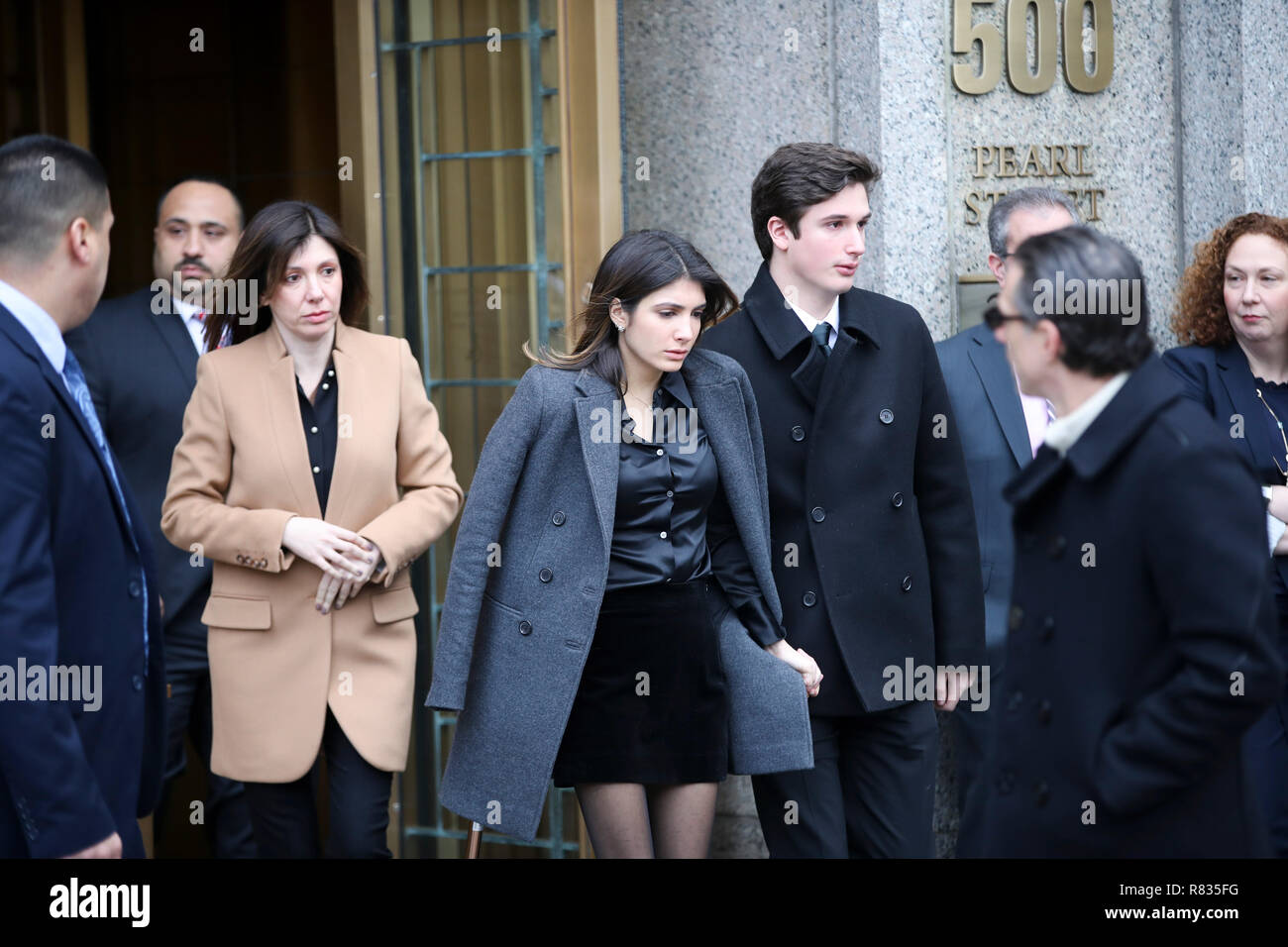 New York, USA. 12th Dec, 2018. Michael Cohen's wife Laura Shusterman (3rd L) and his children Samantha (4th L) and Jake (5th L) walk out of a court building in New York, the United States, Dec. 12, 2018. Michael Cohen, U.S. President Donald Trump's former long-term personal attorney, was sentenced to three years in jail on Wednesday after pleading guilty to a series of crimes, including campaign finance violations, tax evasion and lying to Congress. Credit: Wang Ying/Xinhua/Alamy Live News Stock Photo