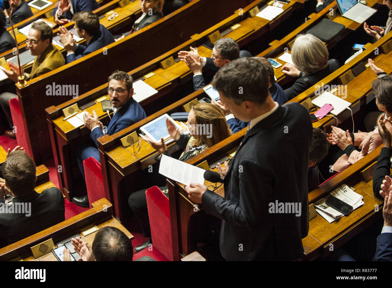 Paris, Ile de France, France. 12th Dec, 2018. Bruno Studer seen paying tribute to the victims of the Starsbourg bombing at the session of questions to the government at the National Assembly. Credit: Thierry Le Fouille/SOPA Images/ZUMA Wire/Alamy Live News Stock Photo