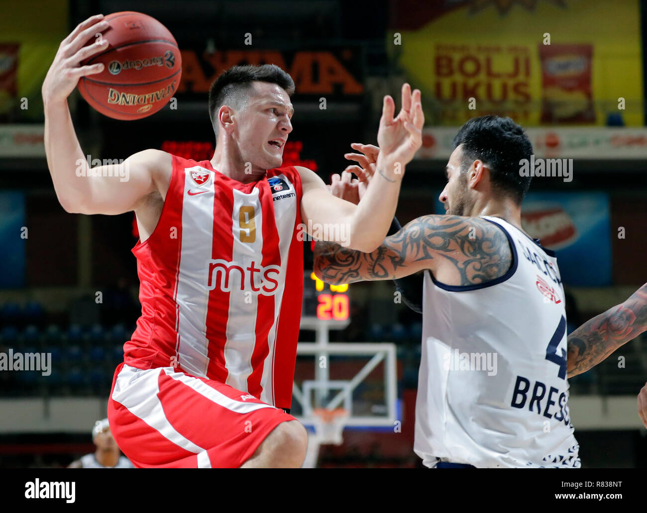 Belgrade. 12th Dec, 2018. Crvena Zvezda's Nemanja Nenadic (L) competes during the round 9 match at the regular season of 2018-2019 Eurocup basketball tournament between Crvena Zvezda and Brescia in Belgrade, Serbia on Dec. 12, 2018. Crvena Zvezda won 103-67. Credit: Predrag Milosavljevic/Xinhua/Alamy Live News Stock Photo