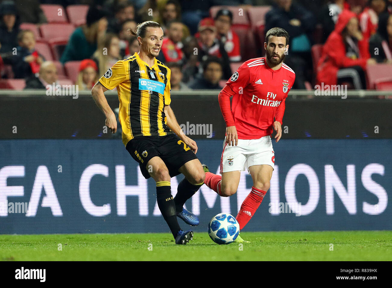 Niklas Hult of AEK Athens F.C. (L) vies for the ball with Rafa Silva of SL  Benfica (R) during the UEFA Champions League 2018/19 football match between  SL Benfica vs AEK Athens