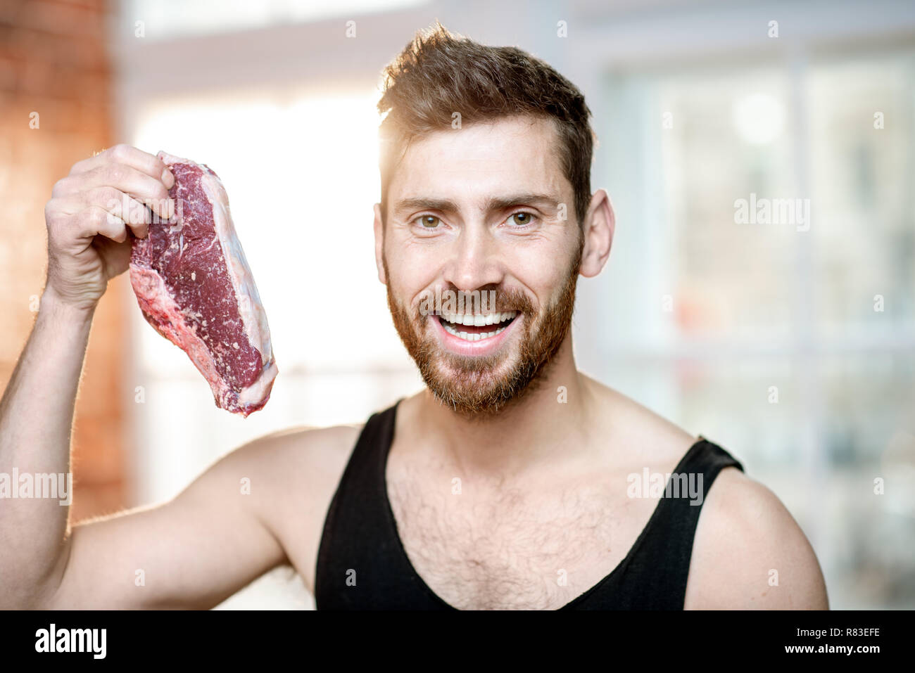 Muscle meat man eating hires stock photography and images Alamy