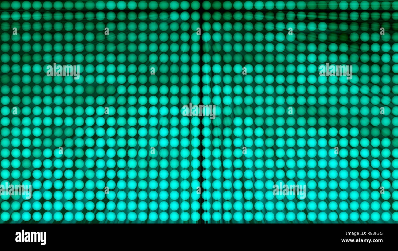 Many rows of balls changing color and rays modern abstraction