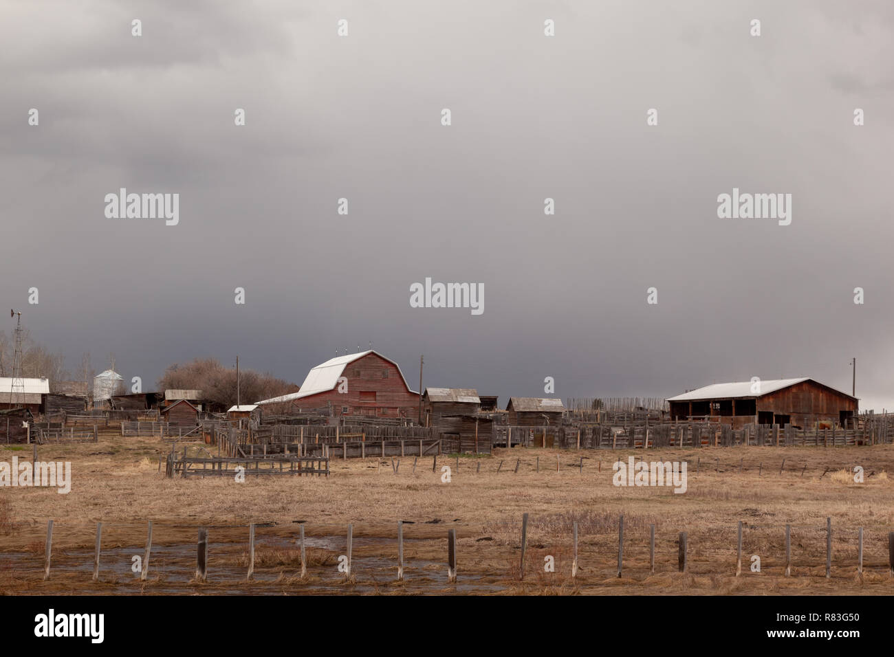 Old Red Barn With Red Building With Livestock Wooden Paddock And