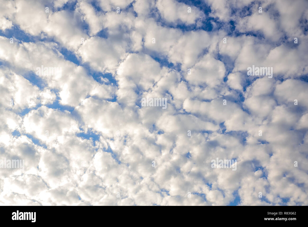blue sky background with white and fluffy clouds Stock Photo - Alamy
