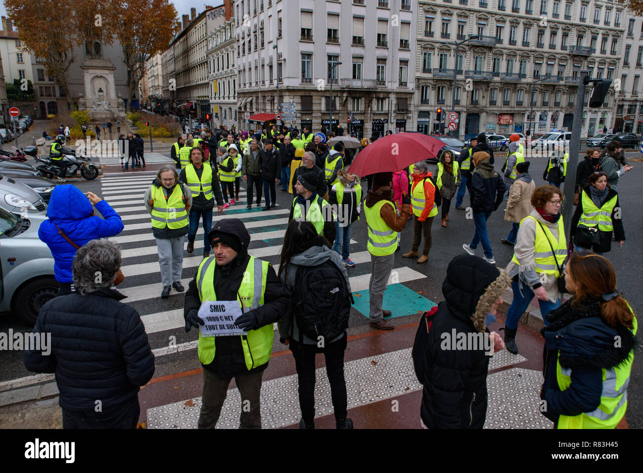 Yellow Vests (Gilets Jaunes) protesters against fuel tax, government, and  French President Macron blocking off roads in Lyon, France Stock Photo -  Alamy