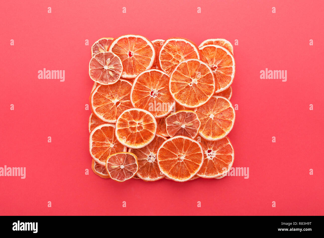 Dried Citrus Slices Lemons Oranges On Coral Pink Colored