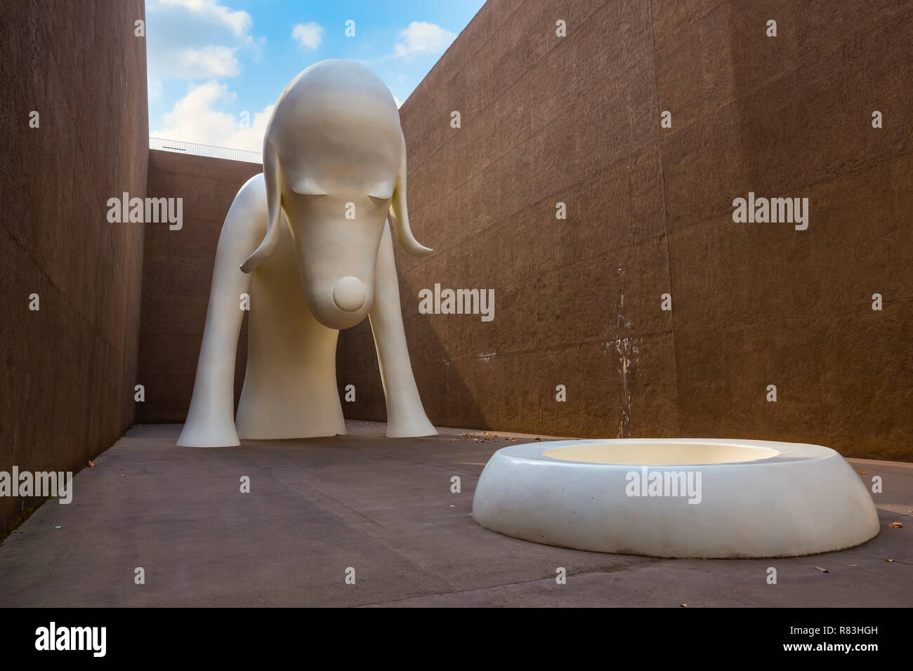 Tokyo, Japan - April 22 2018:  Aomori Dog Statue a gigantic white dog over 8.5 meters tall at The Aomori Museum Stock Photo