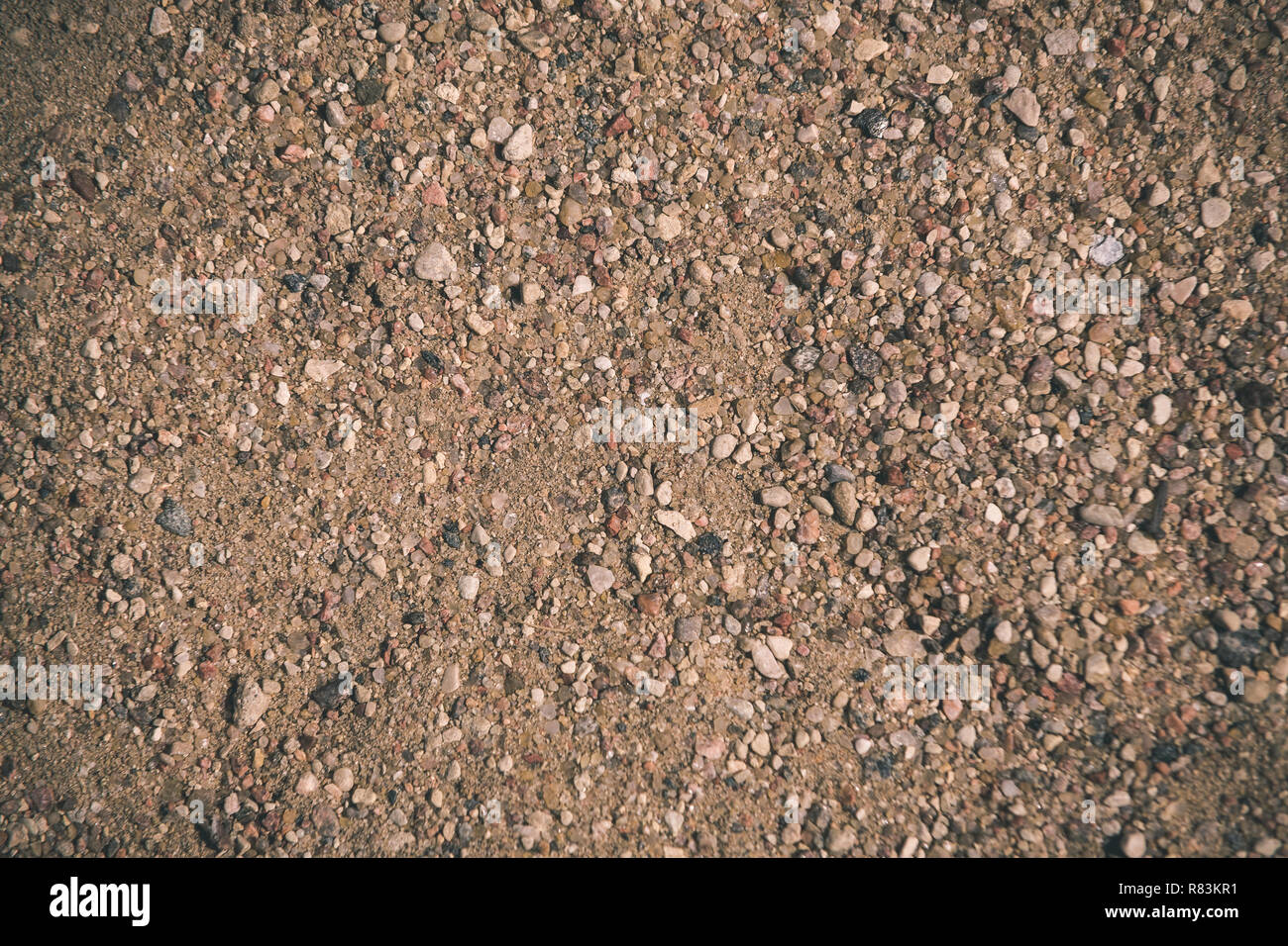 abstract texture sand pattern near water body with some plants ...
