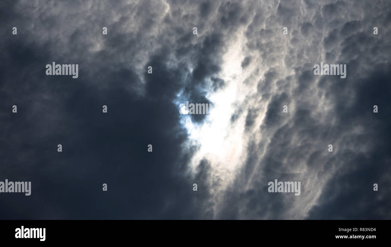 cumulus clouds like fluffy, white cotton balls on the blue sky