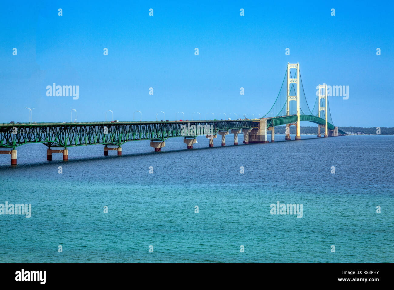 The Mackinac Bridge, opened in 1957, spans the Straits of Mackinac to connect Michigan's upper and lower peninsulas. Stock Photo