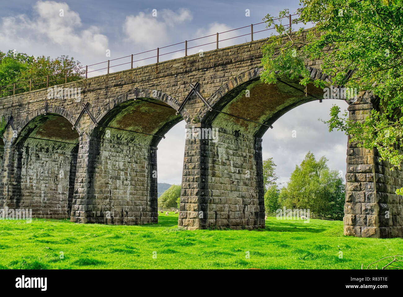 Railway viaduct over the River Keer at Capernwray, Cumbria. Stock Photo