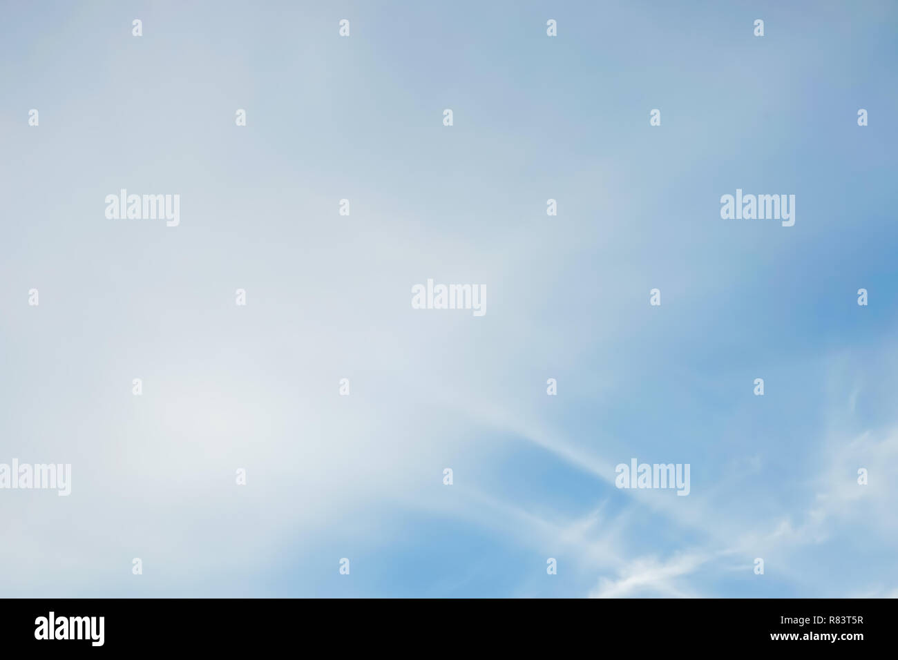 blue sky with white soft clouds, blurry image Stock Photo