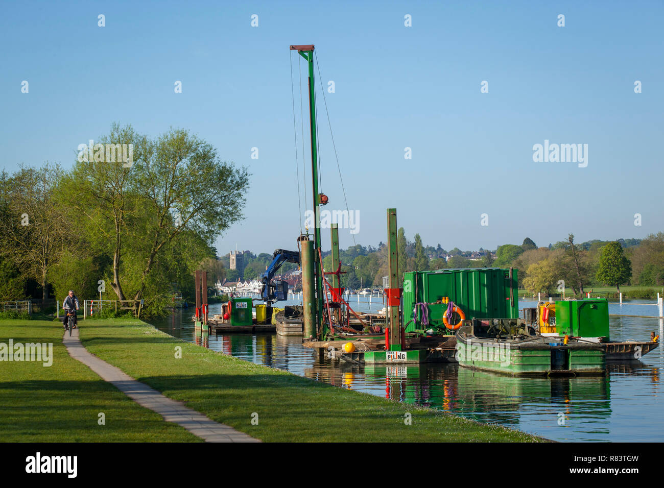 The pile-driving barge for positioning the booms and structures that mark out the course of Henley Royal Regatta Stock Photo