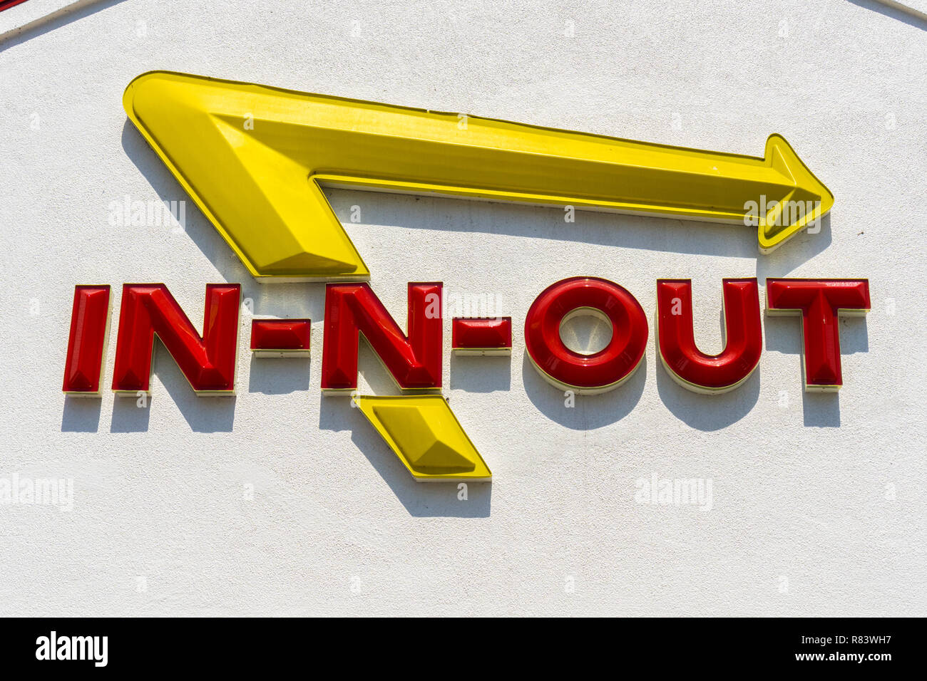 September 4, 2018 San Jose / CA / USA - Close up of In-N-Out logo displayed above the entrance to one of their locations in south San Francisco bay ar Stock Photo