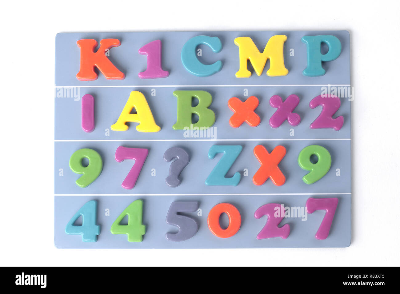 Colored magnetic letters on blue hi-res stock photography and images ...