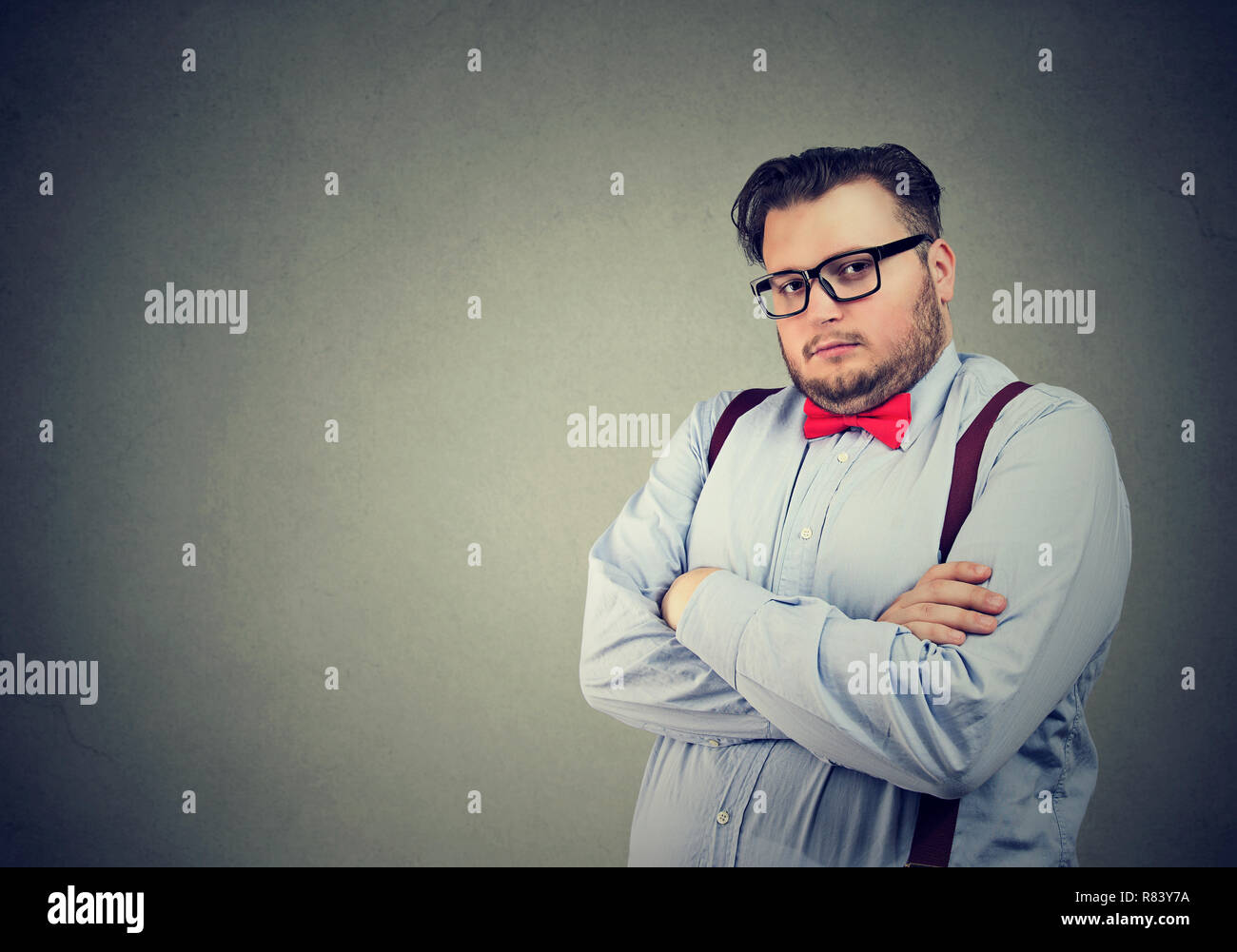Portrait of a serious business man with snobbish face expression Stock Photo
