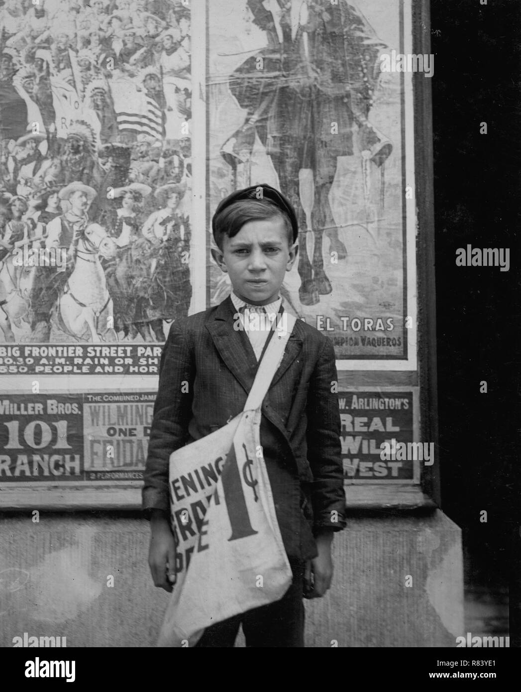 TITLE:  S. Russell, 33 E. 22nd St. Newsboy, 12 years of age. Selling newspapers 2 years. Average earnings 20 cents daily. Selling newspapers own choice. Father earns $18 weekly. Boy deposits earnings in du Pont Savings Bank, and on Saturday night works for Reynold's candy shop, delivering packages. Don't smoke. Visits saloons. Works 5 hours daily, except Saturday, when he works 11. Location: Wilmington, Delaware.  CALL NUMBER:  LOT 7480, v. 2, no. 1511[P&P]   Check for an online group record (may link to related items)  REPRODUCTION NUMBER:  LC-DIG-nclc-03574 (color digital file from b&w origi Stock Photo