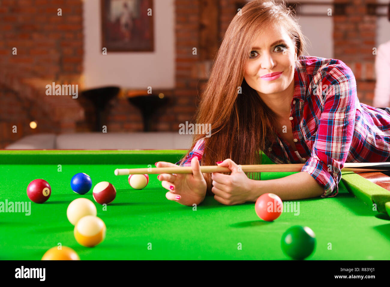 Fashion and fun concept. Young charming girl posing by billiard pool.  Attractive fashionable woman casual style spending time on recreation Stock  Photo - Alamy